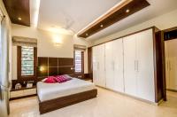 The wardrobe in the master bedroom. The door on the right leads to the dressing area and bathroom.